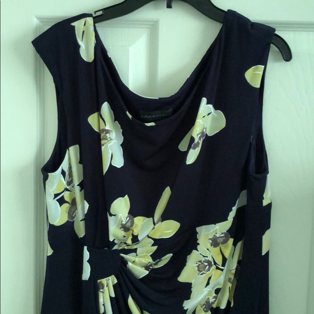 Navy knee length dress with yellow flowers